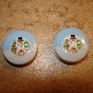 Set of 2 Christmas buttons with snowman and Christmas wreath.