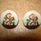 Set of 2 picture like Christmas buttons with colorful snowman.