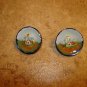 Set of 2 nicely painted buttons with lighhouse.