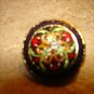 Vintage metal button with painted art nouveau patern.