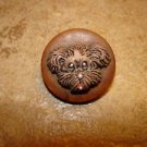 Medium plastic button with brown dog's head. Medium plastic button with brown dog's head.