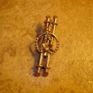 Gold tone metal button with tiny pearls