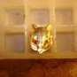 Gold metal pinback pin with fox head.