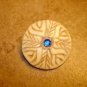Nicely carved faux bone carved button with rhinestone