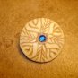 Nicely carved faux bone carved button with rhinestone