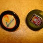 Lot of 2 advertising plastic buttons for Spontex and Vivo.