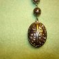 Vintage silver metal religious key chain with cross.