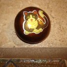Large dome shape button with brown cat. Large dome shape button with brown cat.