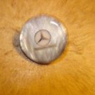 Mother of pearl advertising button for Mercedes Benz car.