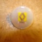 Mother of pearl advertising button for Renault car.