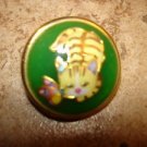 Large dome shape metal button with cat and butterfly.