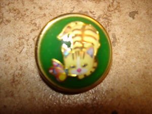 Large dome shape metal button with cat and butterfly.