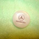 Mother of pearl advertising button for Mercedes car. Mother of pearl advertising button for Mercedes car.