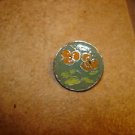 Signed silver metal button with orange flower. Signed silver metal button with orange flower.