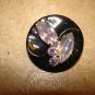 Large black plastic button with glass beads & rhinestones.