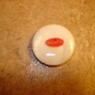 Mother of pearl (or plastic) advertising button for Bugatti sports car. Mother of pearl (or plastic) advertising button for Bugatti sports car.