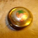 Gold metal button with strawberry. Gold metal button with strawberry.