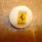 Old mother of pearl advertising button for Ferrari car.