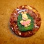 Large faux tortoise shell button with Easter bunny.