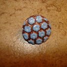 Vintage brass button with painted Forget me not flowers. Vintage brass button with painted Forget me not flowers.