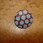 Vintage brass button with painted Forget me not flowers.