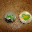 Lot of (2) Two mother of pearl like funny buttons. Lot of (2) Two mother of pearl like funny buttons.