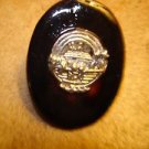 Large oval shape faux tortoisse shell button with Noah's arc. Large oval shape faux tortoisse shell button with Noah's arc.