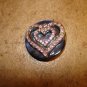 Old blue mother of pearl button with heart and pink rhinestones.