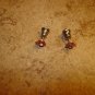 Heart shape metal earings with rhinestone.