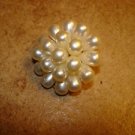 Metal button with tier shape pearls.