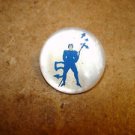 Old mother of pearl button with blue devil. Old mother of pearl button with blue devil.