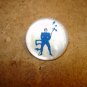 Old mother of pearl button with blue devil.