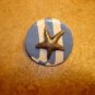 Metal button with ocean star.