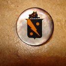 Mother of pearl button with Spanish erb.