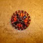 Vintage metal button with beautiful red & purple rhinestones.