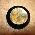 Large plastic button with teddy bear and kitten. Large plastic button with teddy bear and kitten.