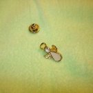 Gold metal angel pin withceramic tier and rhinestone. Gold metal angel pin withceramic tier and rhinestone.