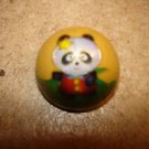 Dome shape metal button with panda bear.