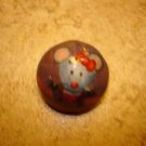 Old dome shape metal button with funny mouse.