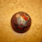 Old dome shape metal button with funny mouse.