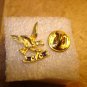 Gold tone all metal pin badge Eagle CFC.