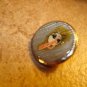 Metal button with Douglas Air sign