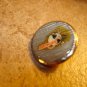 Metal button with Douglas Air sign