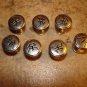 Lot of 7 silver metal buttons.