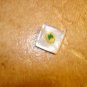 Square Mother of pearl button with 3 leafs cloves.