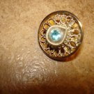 Delicate vintage metal  button with saphire color stone.