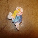 Wood button with fairy holding shining star.