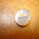 Mother of pearl advertising button for Corona.