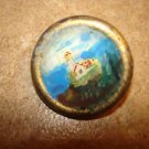 Nicely painted plastic and metal button with ligthouse.