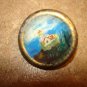 Nicely painted plastic and metal button with ligthouse.